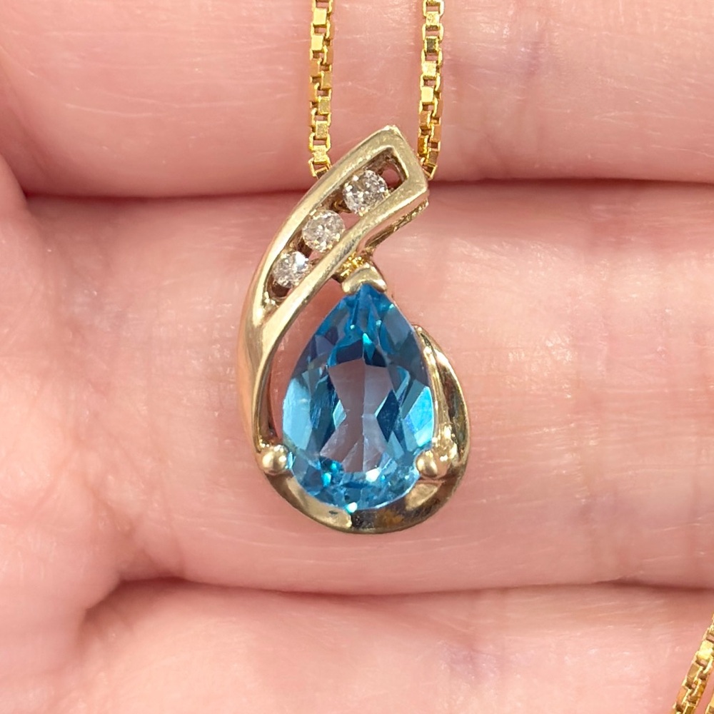 Vintage Swiss Blue Topaz Pendant: 10K Yellow Gold Diamond Accent